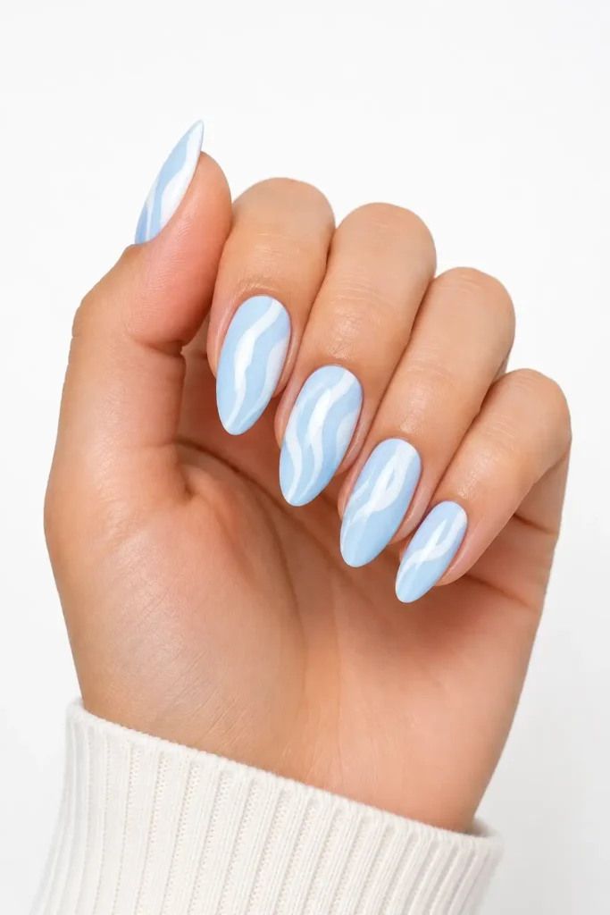 Light Blue Nail Ideas 9 7. Light Blue and White Swirl Nails