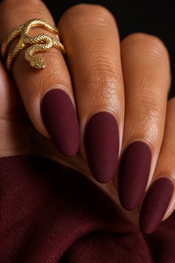 20. Velvet nails in deep berry on long oval nails